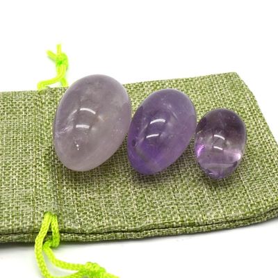 OEM aceita ovos de Yoni esculpidos para exercício vaginal ovos de jade de ametista natural perfurado