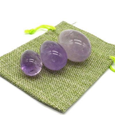 OEM aceita ovos de Yoni esculpidos para exercício vaginal ovos de jade de ametista natural perfurado