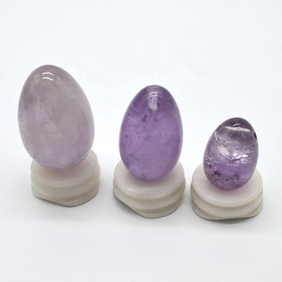 OEM aceita ovos de Yoni esculpidos para exercício vaginal ovos de jade de ametista natural perfurado