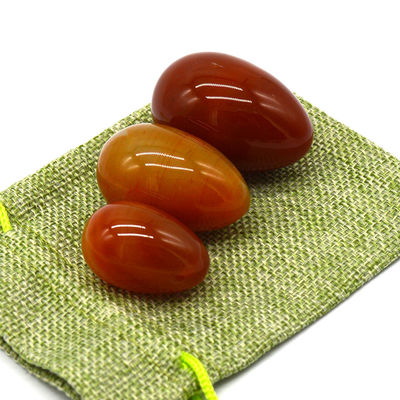 OEM ODM aceito Carnelian vermelho Yoni ovos de pedra semi preciosa ovos perfurados estilo de massagem