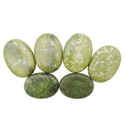 Pedras quentes curativas de jade Xiuyan para massagem profissional e relaxamento no spa.