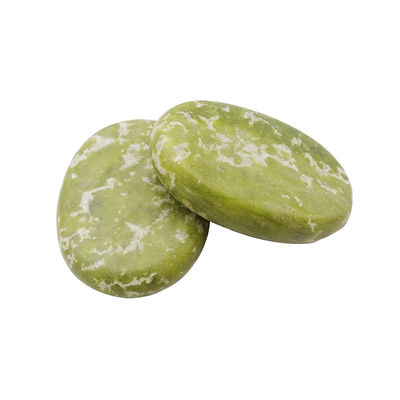 Pedras quentes curativas de jade Xiuyan para massagem profissional e relaxamento no spa.