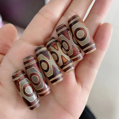 Técnica Pedra preciosa natural polida Tibetan 9Eye Dzi Bead 40mm Agate Barrel Beads para jóias