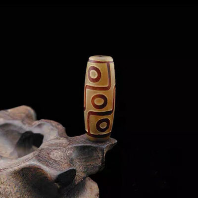 Técnica Pedra preciosa natural polida Tibetan 9Eye Dzi Bead 40mm Agate Barrel Beads para jóias