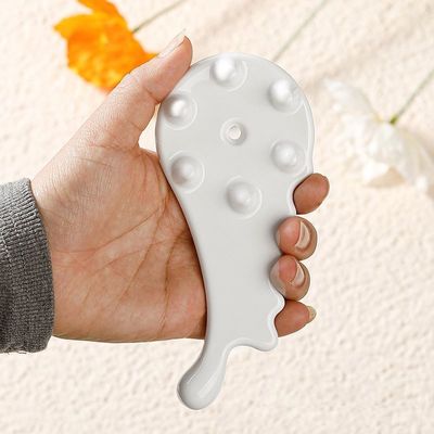 Experimente o poder curativo do pente Gua Sha de cerâmica para massagem facial e corporal