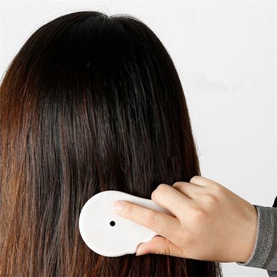 Experimente o poder curativo do pente Gua Sha de cerâmica para massagem facial e corporal
