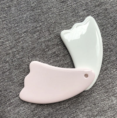 2024 Design Multi Função Cerâmica única Guasha raspando corpo facial Gua Sha massagista para rejuvenescimento do rosto e do corpo
