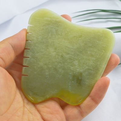 Diz adeus à tensão muscular e olá à pele radiante com o Xiuyan Jade Gua Sha Scraping Board