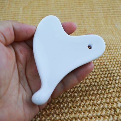 Quadro cerâmico Gua Sha para relaxar os músculos em todo o corpo