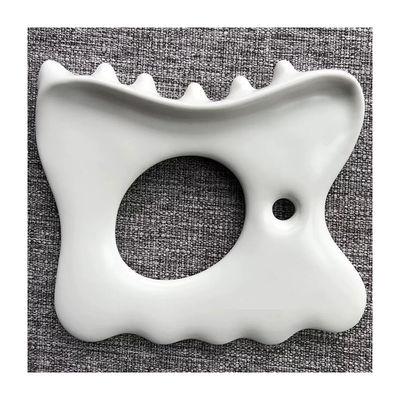 Aliviar o estresse muscular e dor com logotipo personalizado cerâmica Gua Sha ferramenta massagem linha da mandíbula
