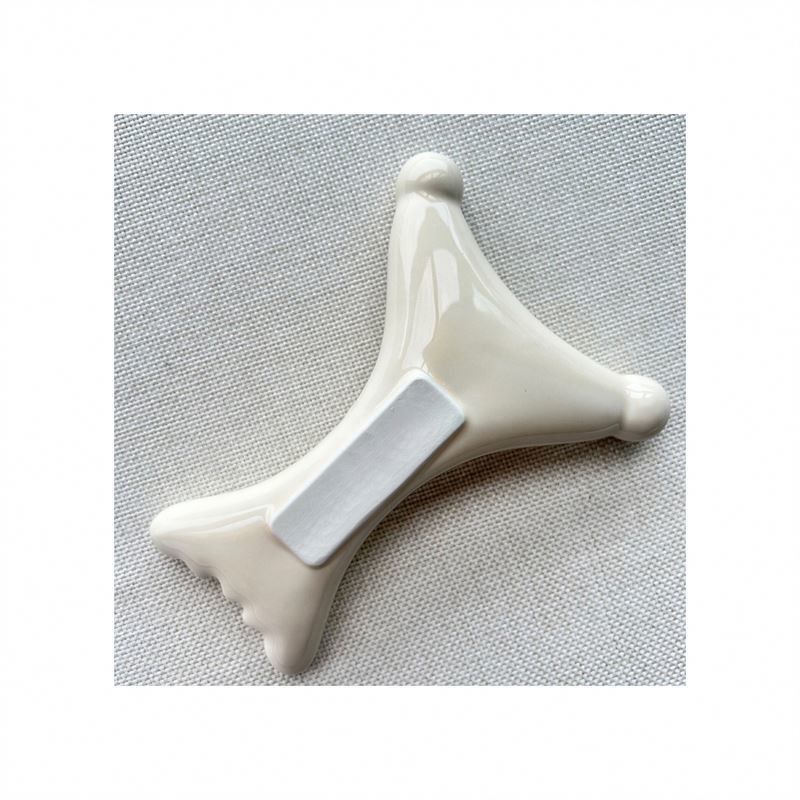 OEM/ODM Gua Sha em forma de X de cerâmica de raspagem Massagista Salão de beleza essencial para relaxamento facial